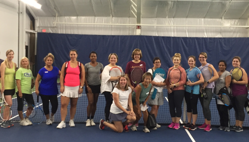 ladies playing tennis